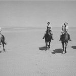 Violet Barnard (nee Gover) and her Mother with two unknown companions riding on Holkham beach in 1938.