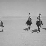 Violet Barnard (nee Gover) and her Mother with two unknown companions riding on Holkham beach in 1938.